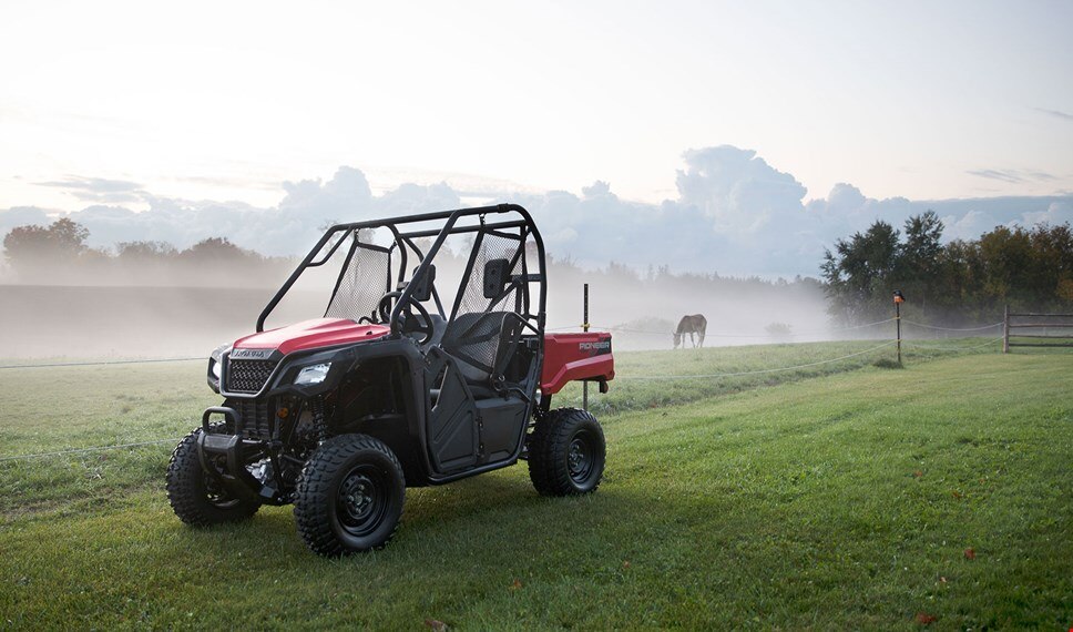 Front view of Pioneer 520 in front of grassy field